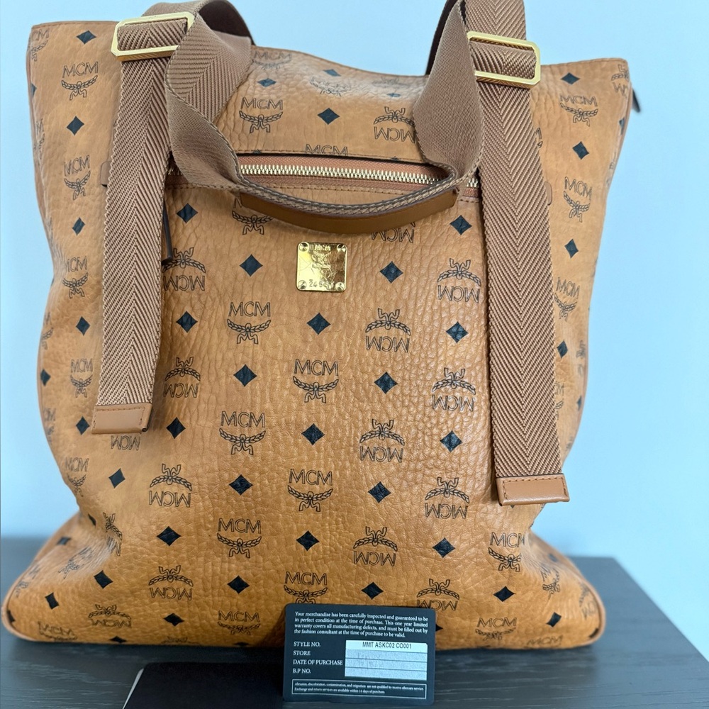 MCM Black Warranty Card